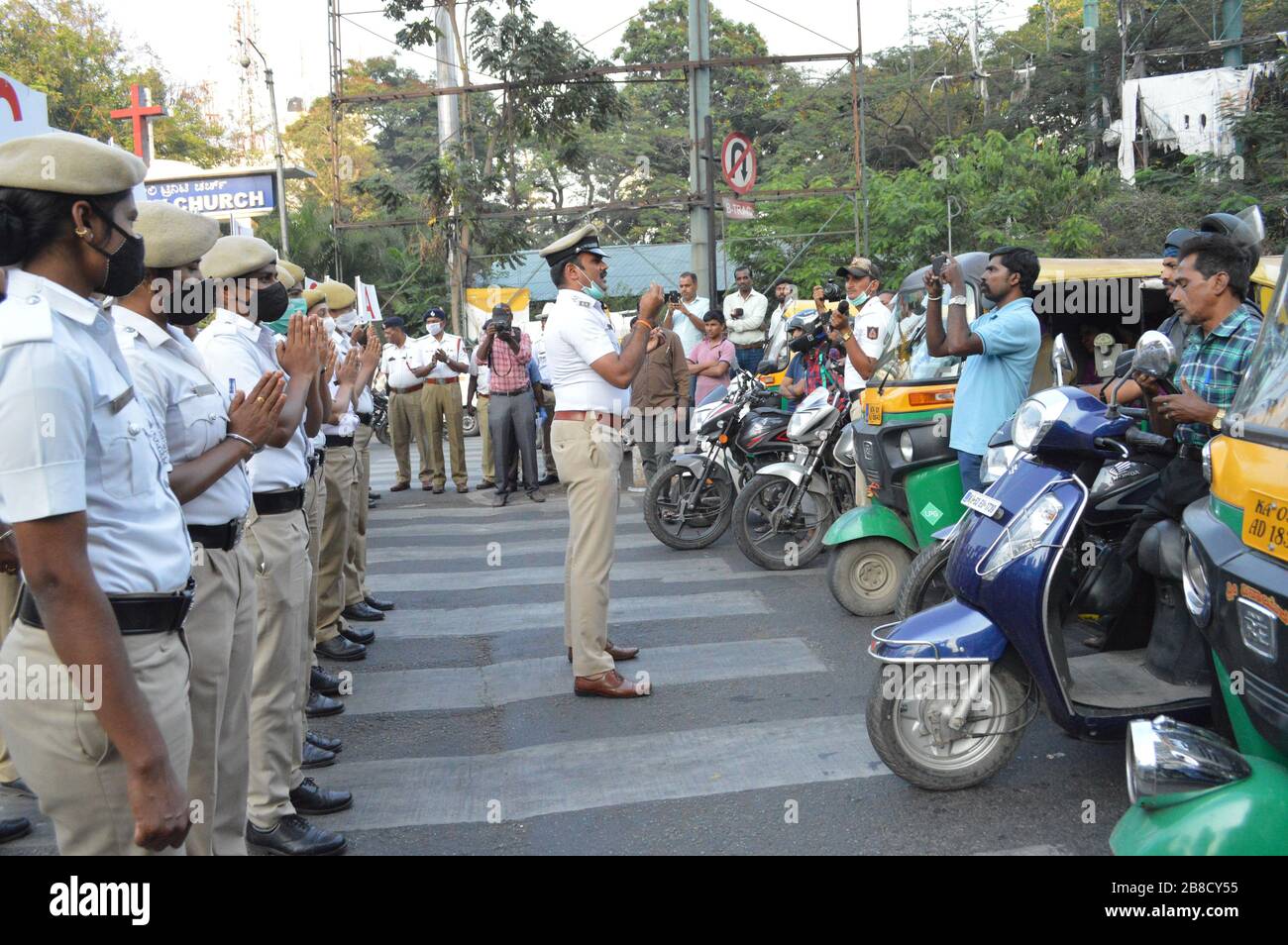 Bangalore, India. 21st Mar, 2020. Indian traffic police conduct an awareness campaign to prevent the spread of the novel coronavirus, in Bangalore, India, March 21, 2020. Credit: Str/Xinhua/Alamy Live News Stock Photo