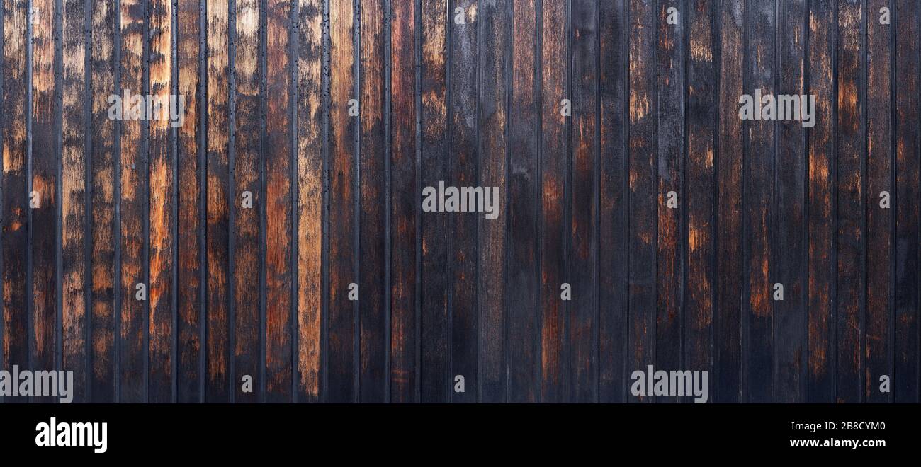 Heavily weathered vertical wooden wall panorama Stock Photo