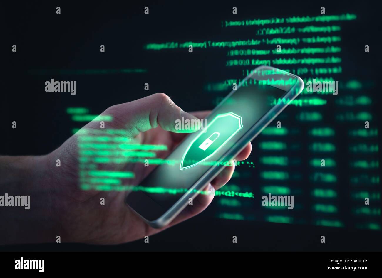 Phishing, cyber security, online information breach or identity theft crime concept. Hacked phone. Hacker and cellphone with hologram data. Stock Photo