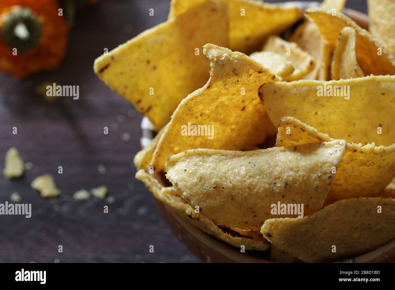 Concept of mexican cuisine. Tortilla chips in a bowl with tomato salsa. Top view. Stock Photo