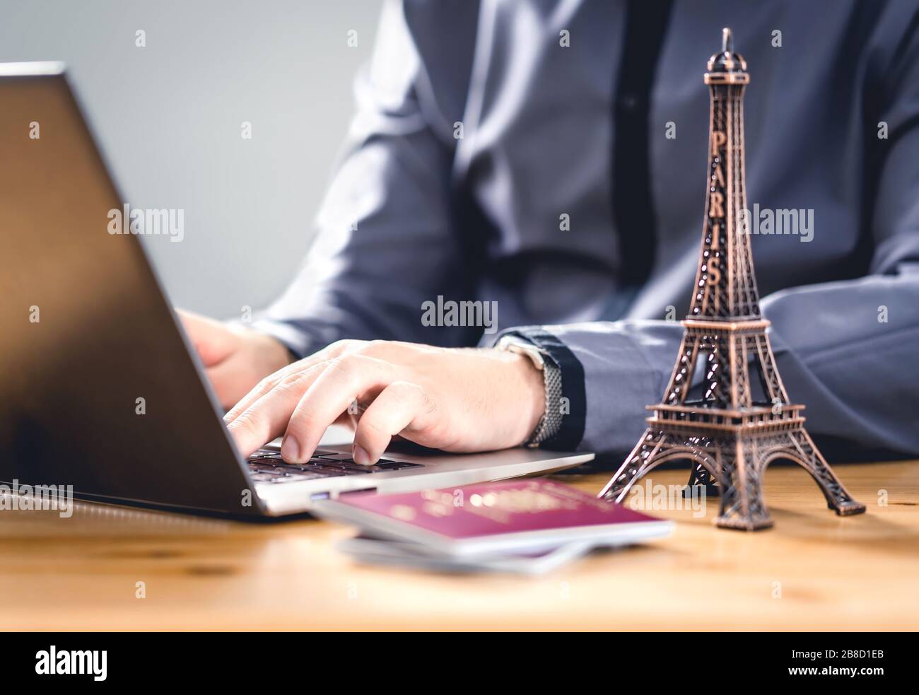 Passport for vacation. Travel document for online reservation or electronic visa identification. Tourism in EU. Tourist booking a holiday in France. Stock Photo