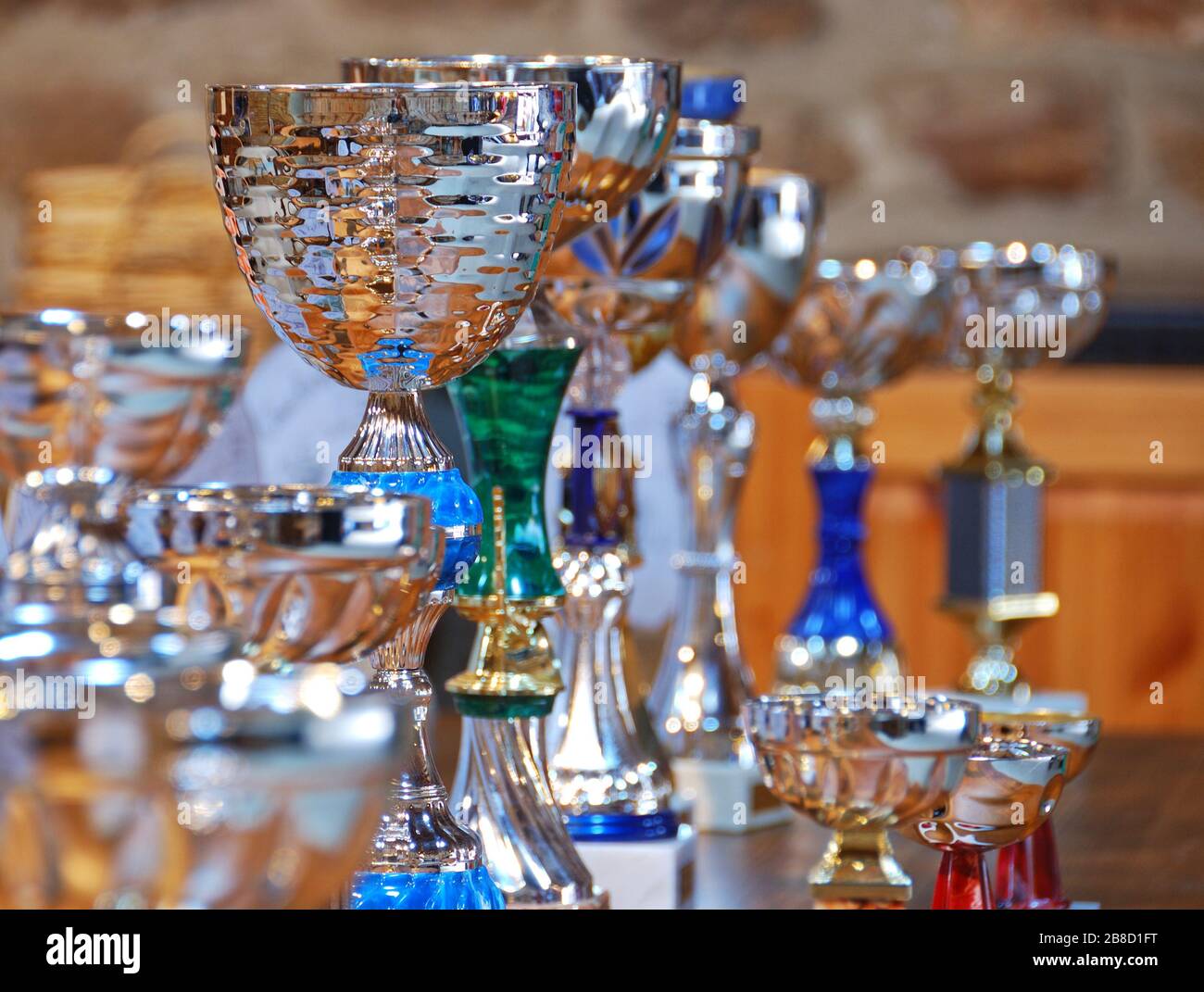 Closeup at various shiny cups prizes, shallow deep of field Stock Photo