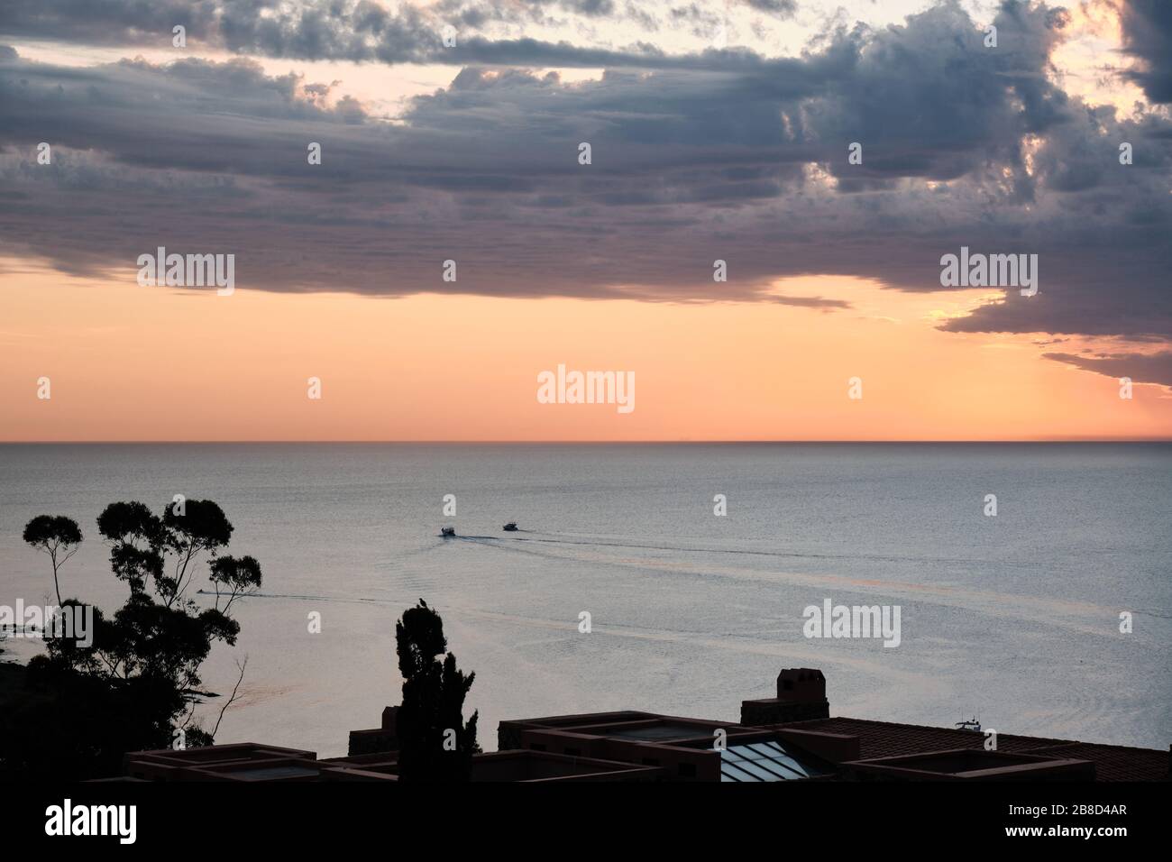 sunset on the sea line horizon of the atlantic sea from Punta Ballena, Maldonado, Uruguay Stock Photo