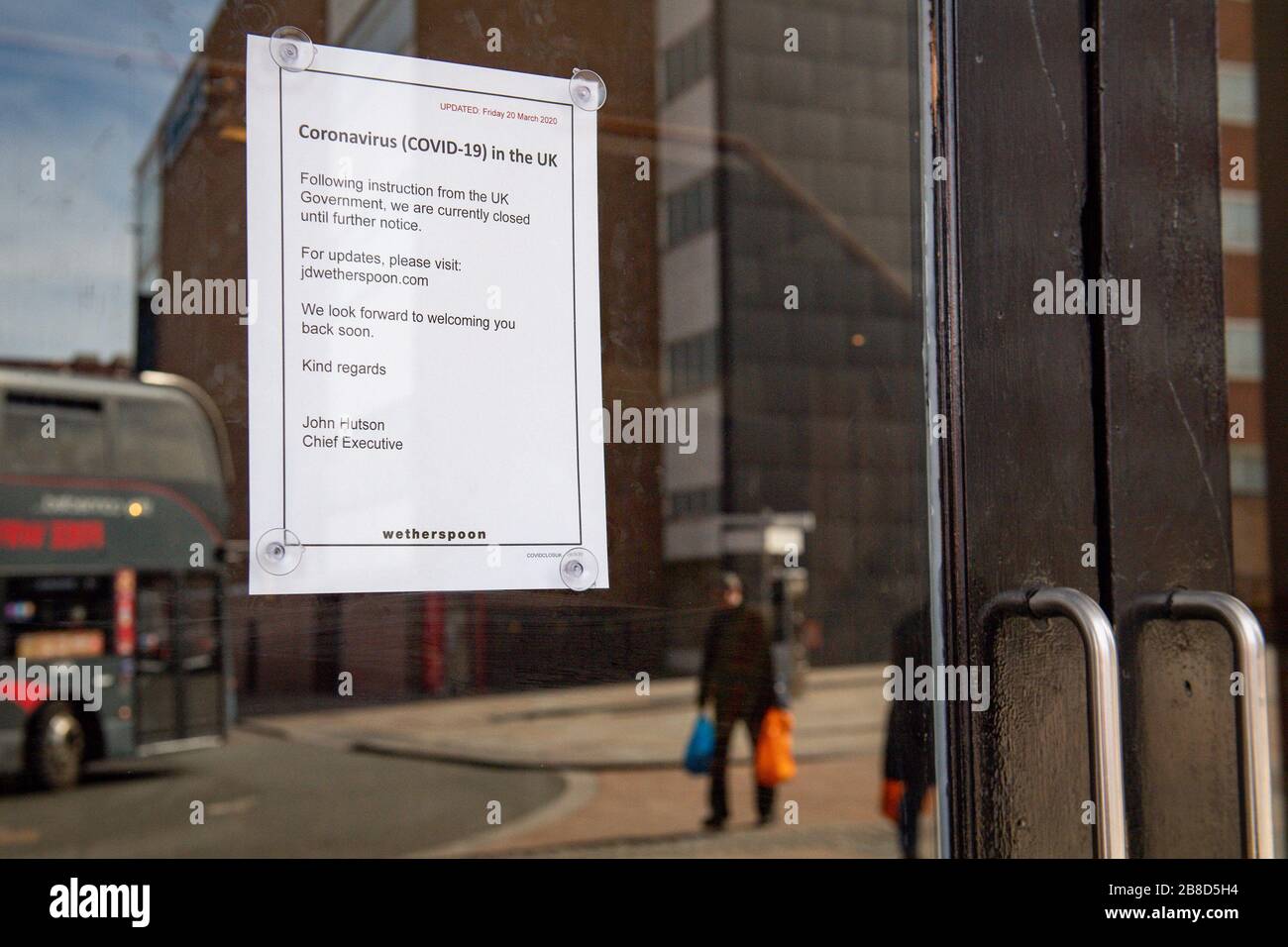 A sign outside a Wetherspoon pub in Coventry, telling it's customers of it's closure until further notice as the Prime Minister Boris Johnson told restaurants, cafes, pubs, bars, gyms and leisure centres to close whilst pleading the public to stay at home, in order to limit the effects of the coronavirus. Picture date Saturday 21st March 2020. See PA story HEALTH Coronavirus. Photo credit should read: Jacob King/PA Wire Stock Photo