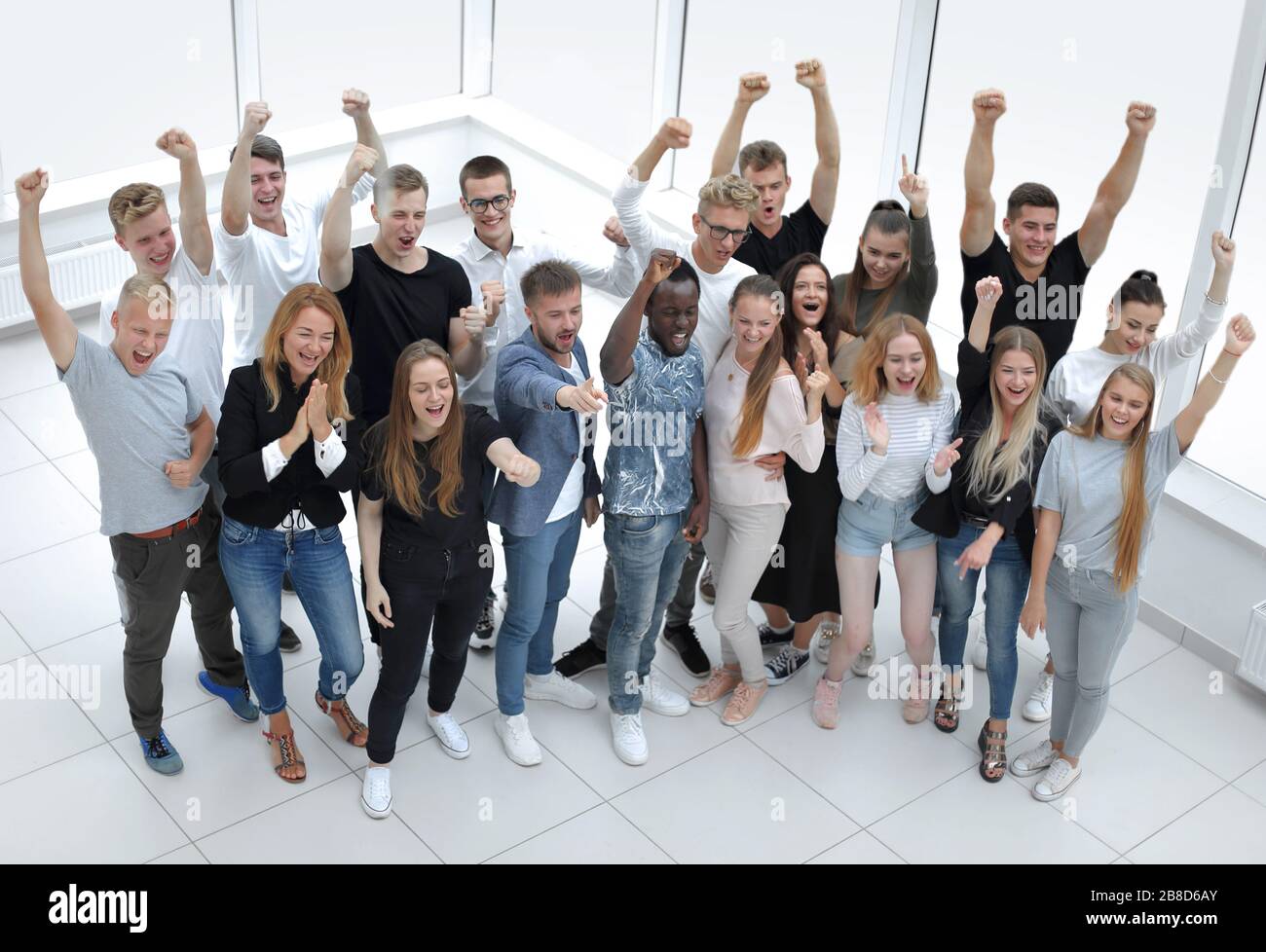 group of diverse young people looking at the camera Stock Photo - Alamy