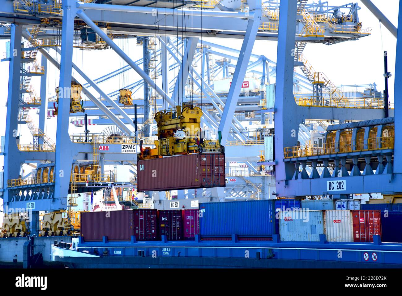Rotterdam, The Netherlands - August 2019; image filling view on the inner structure with beams and booms of numerous gantry cranes moving containers i Stock Photo