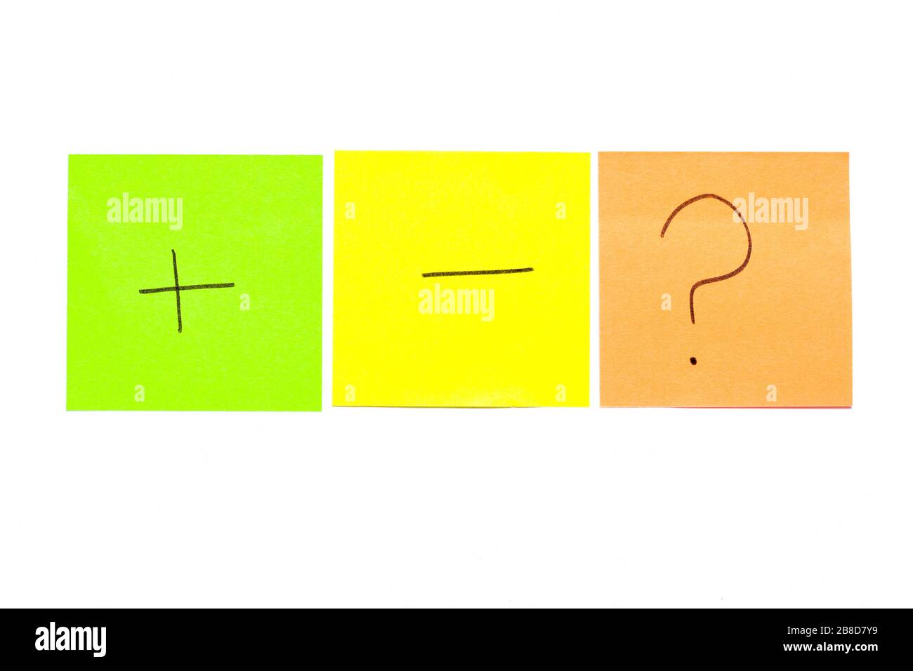 Three post its on white background with a different symbols on it Stock Photo