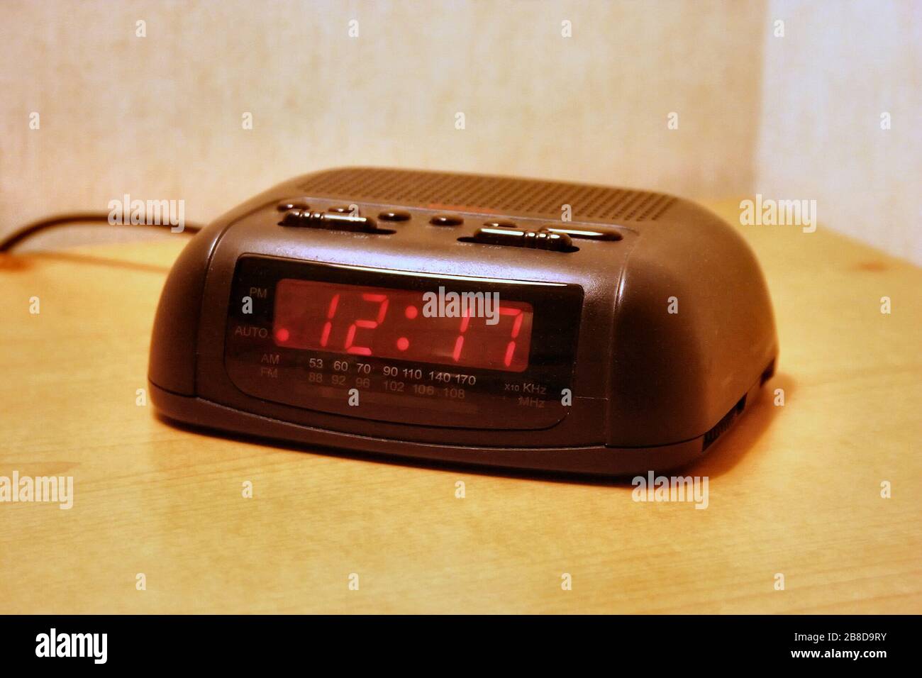 'English: Digital clock of a basic design commonly found in hotels. Original photo shot by Derek Jensen (Tysto), 2005-September-29. Improved by Althepal using Helicon Filter.; 17 January 2007 (original upload date); Transferred from en.wikipedia to Commons by Liftarn using CommonsHelper.; Althepal at English Wikipedia; ' Stock Photo