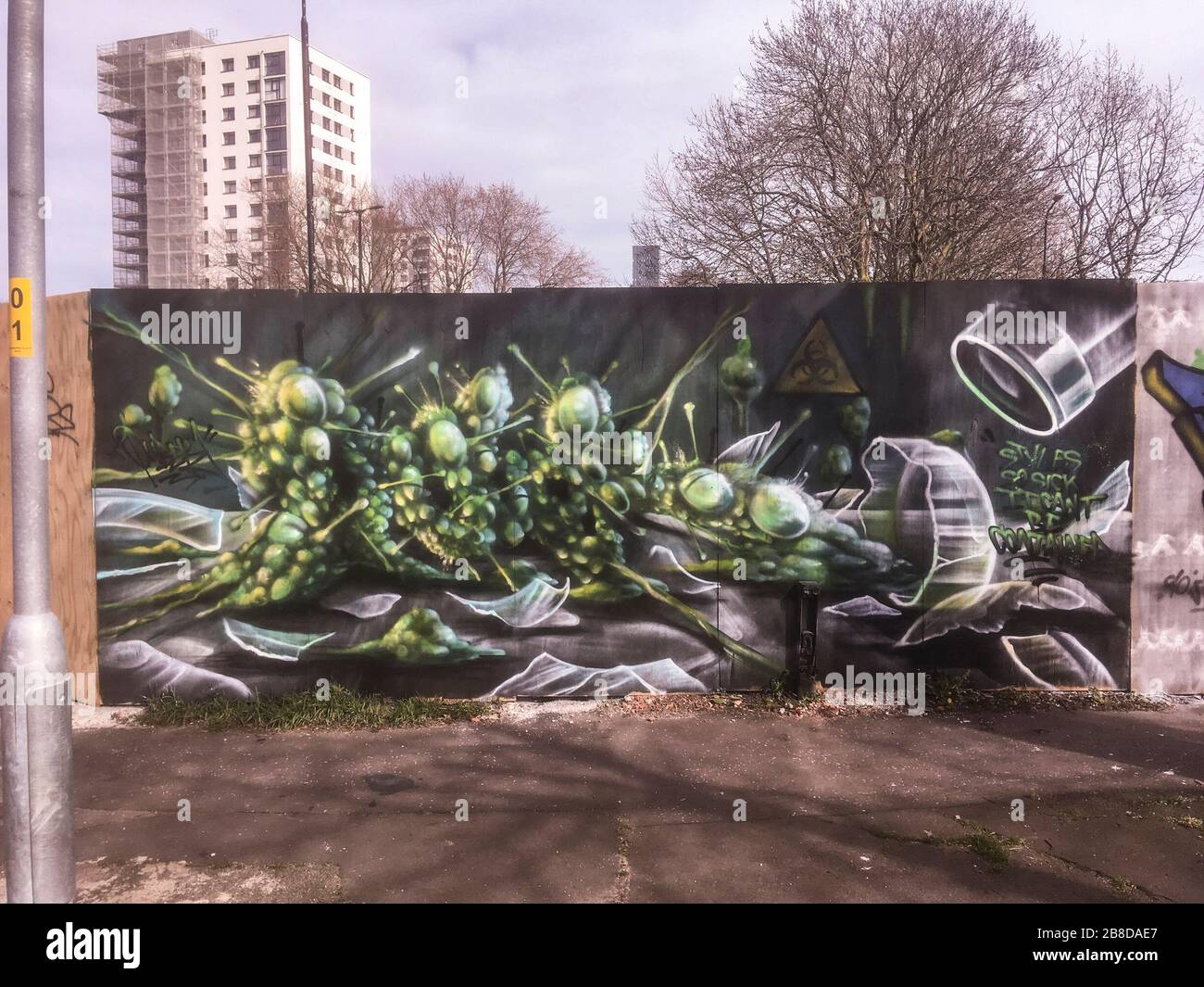 Trafford, Manchester, UK. 21st March 2020. 'Style's so sick it can’t be contained' defiant Coronavirus art after partial UK lock down. Graffiti artist in Trafford Greater Manchester ignores PM's 'urges' to avoid non essential travel and contact today Credit: Gary Roberts/Alamy Live News Stock Photo