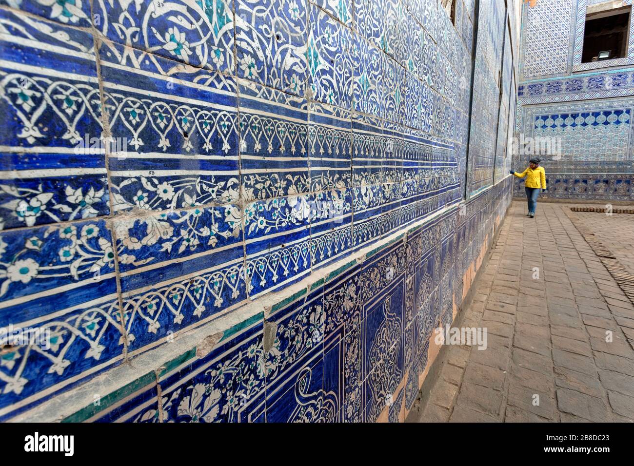pillar tiles high resolution stock photography and images alamy https www alamy com woman sightseeing in the courtyard with carved pillar and painted tiles tosh khovli or khans palace khiva uzbekistan image349419451 html