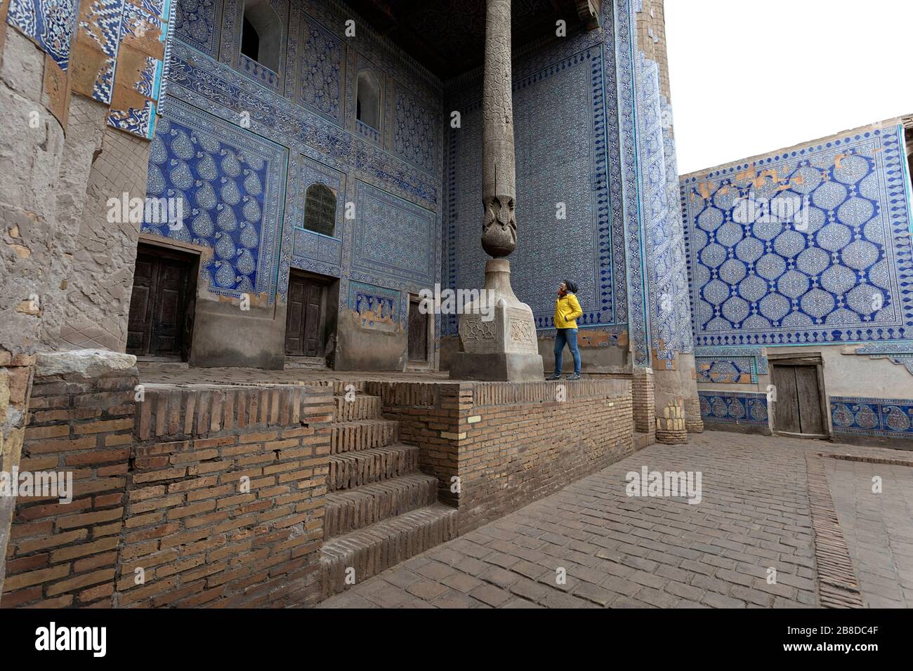pillar tiles high resolution stock photography and images alamy https www alamy com woman sightseeing in the courtyard with carved pillar and painted tiles tosh khovli or khans palace khiva uzbekistan image349419519 html