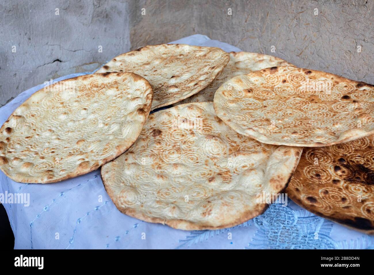 traditional flat bread with a pattern from Clay Oven, Khiva, Uzbekistan Stock Photo