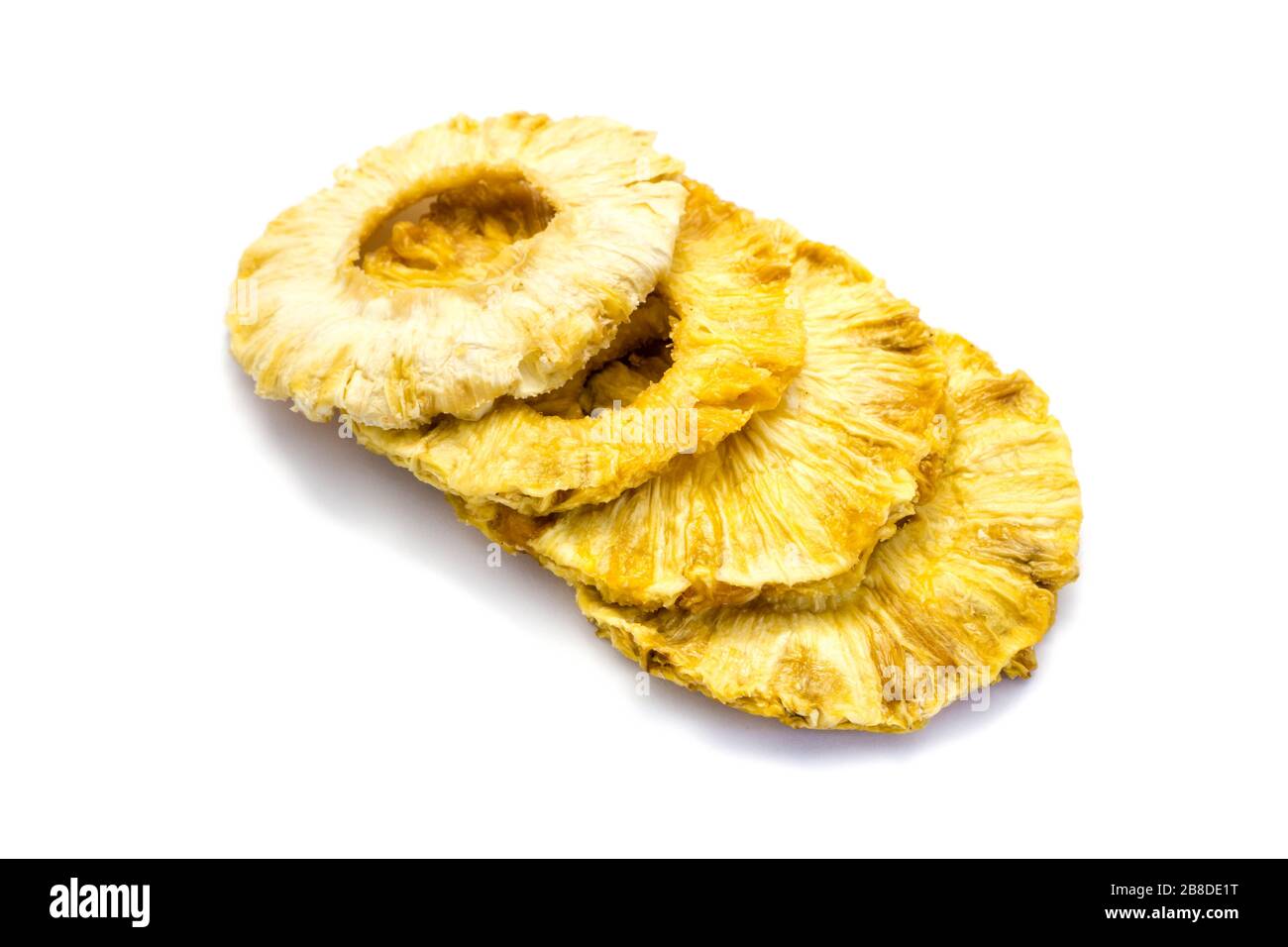 dried pineapple rings on white background Stock Photo