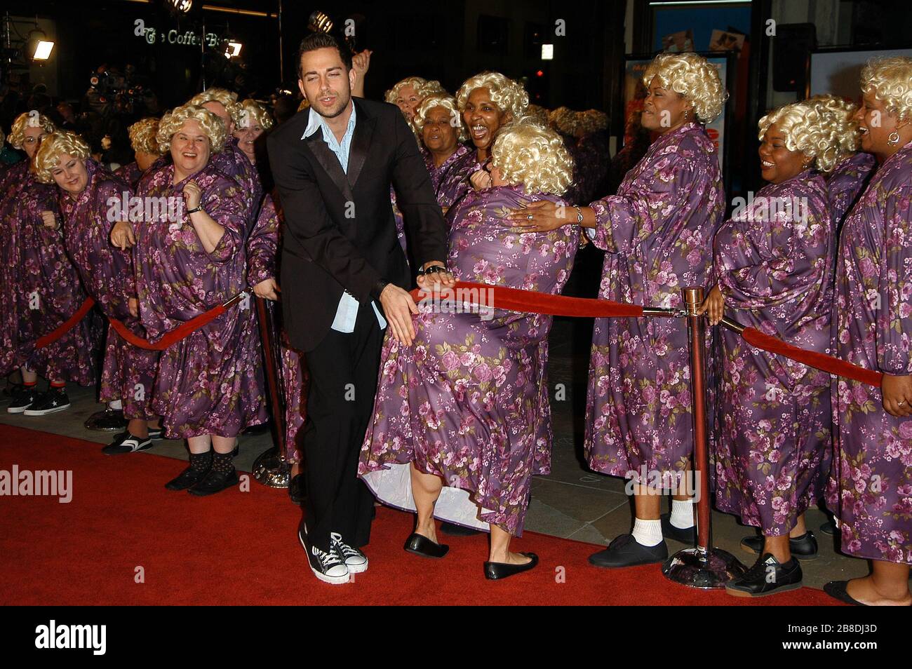 Zachary Levi smacking the behind of a Big Momma at the World Premiere of 