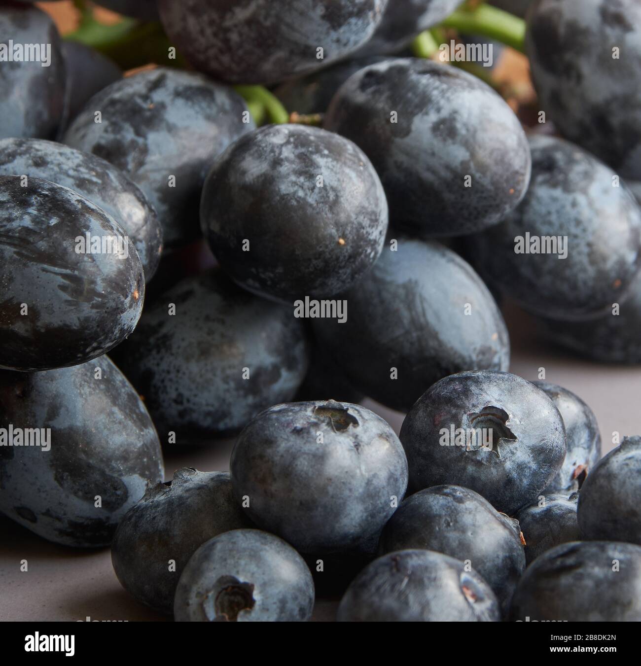 Black Grapes and Blueberries Stock Photo Alamy