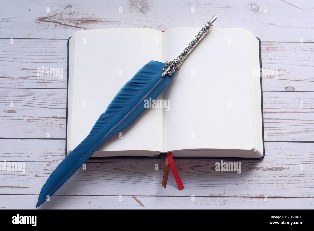 open notebook and fountain pen on table  Stock Photo