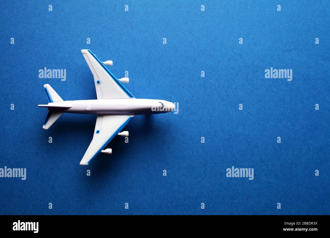 toy passenger plane on a blue background with place for your text Stock ...