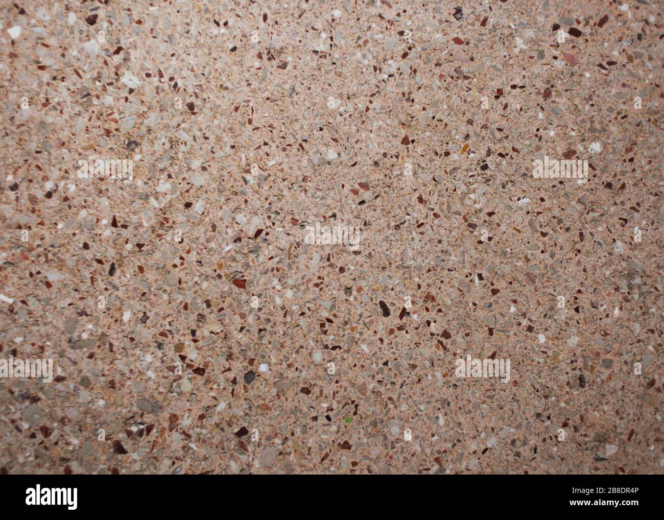 concrete floor with marble chips background texture Stock Photo