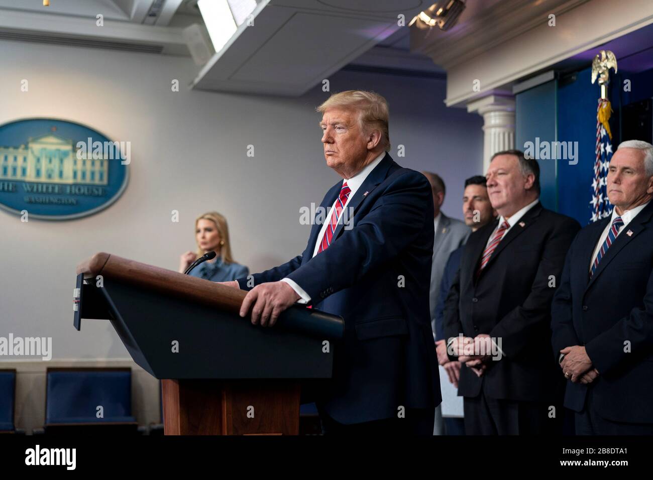 Washington, United States Of America. 20th Mar, 2020. Washington, United States of America. 20 March, 2020. U.S President Donald Trump delivers remarks at the White House Coronavirus Task Force briefing in the Press Briefing Room of the White House March 20, 2020 in Washington, DC. Standing behind the president from left to right are: First daughter Ivanka Trump, Acting Secretary of Homeland Security Chad Wolf, Secretary of State Mike Pompeo and Vice President Mike Pence. Credit: Shealah Craighead/White House Photo/Alamy Live News Stock Photo