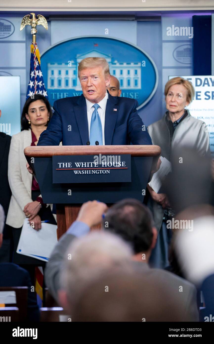 U.S President Donald Trump answers a question from a reporter at the ...