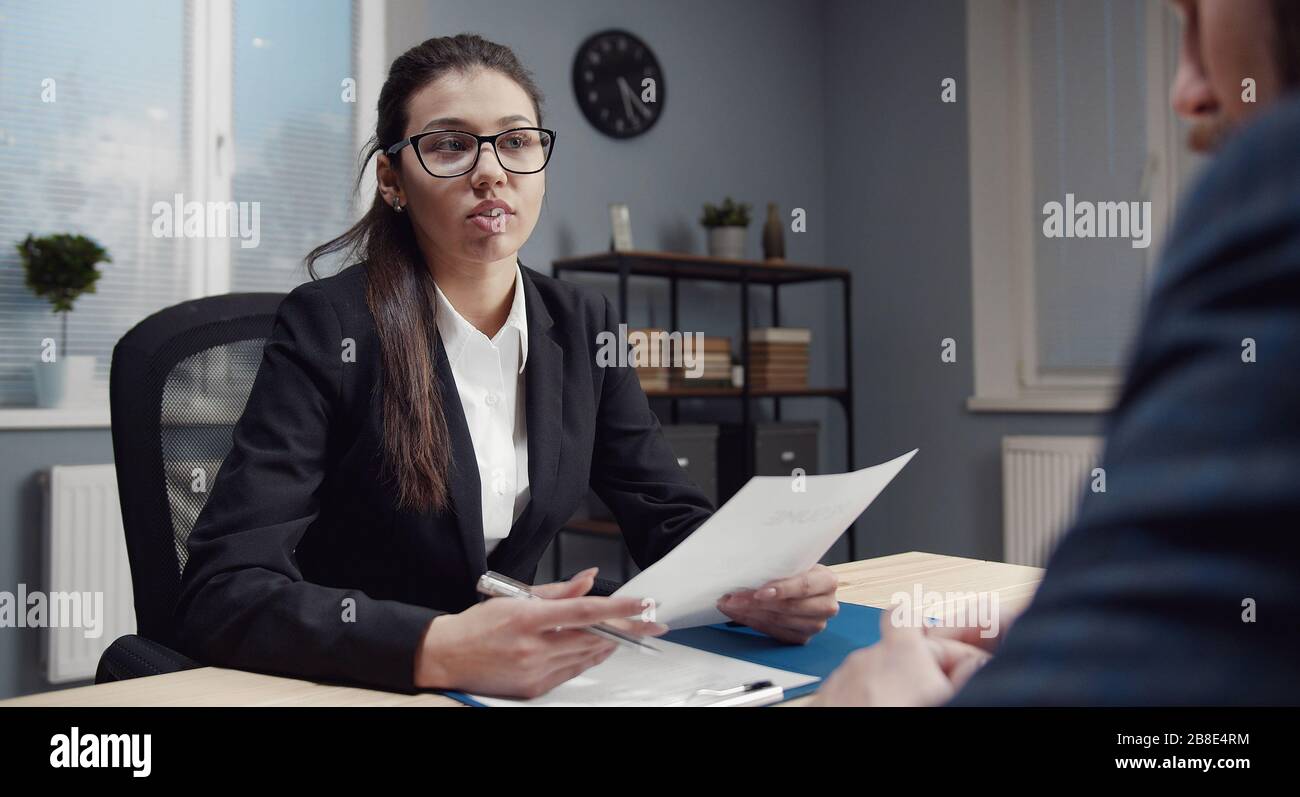 Recruiter checking candidate during interview Stock Photo