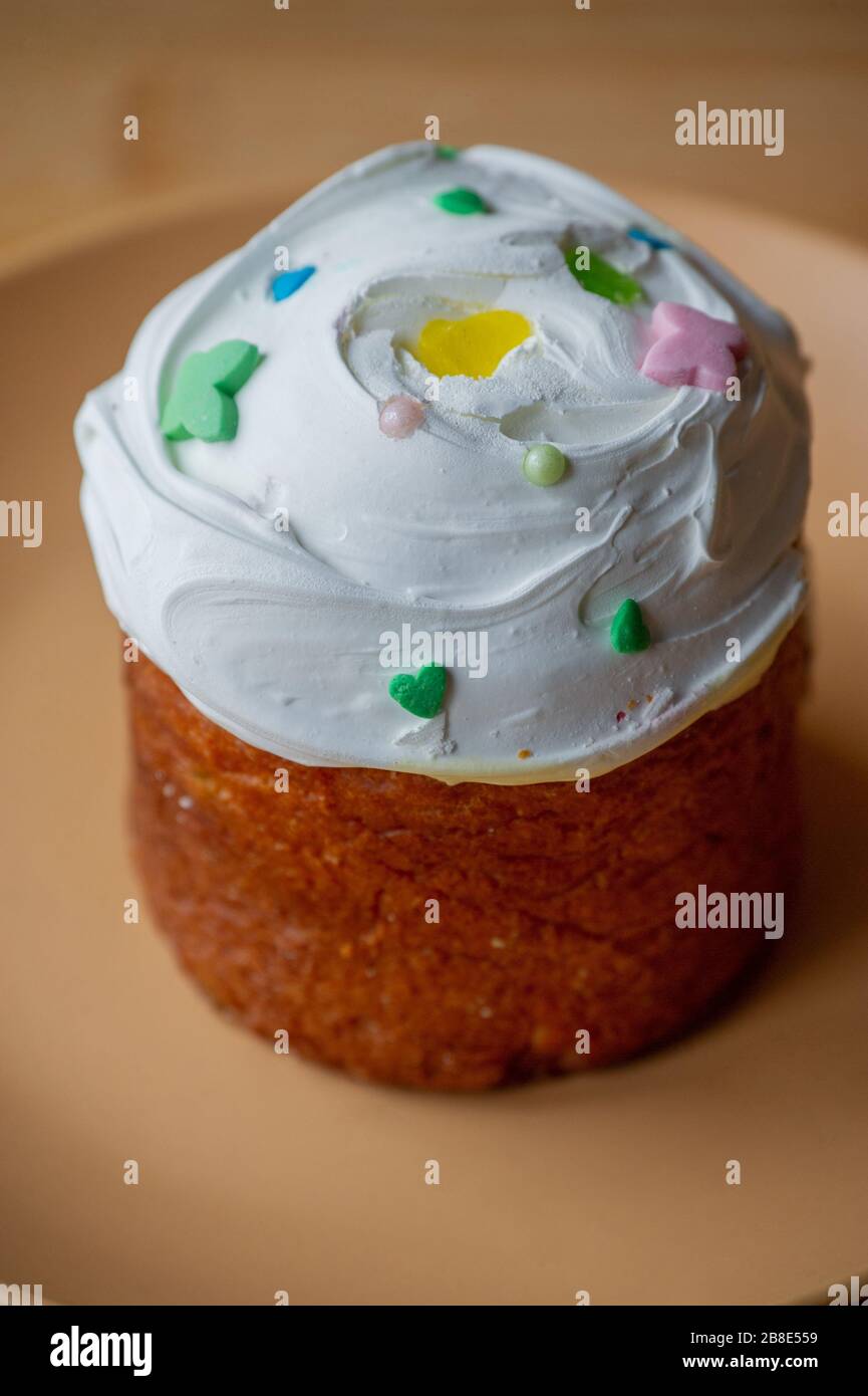 Easter cupcake on a plate. Easter, cupcake, holiday. Plate with easter cupcake. Easter is coming Stock Photo