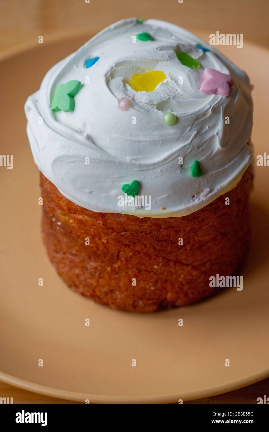 Easter cupcake on a plate. Easter, cupcake, holiday. Plate with easter cupcake. Easter is coming Stock Photo