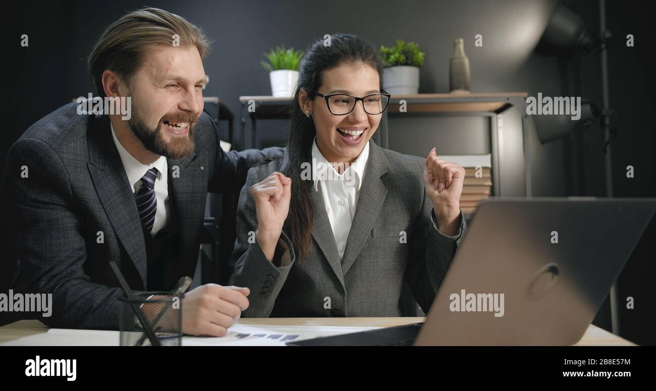 Two colleagues excited about success Stock Photo