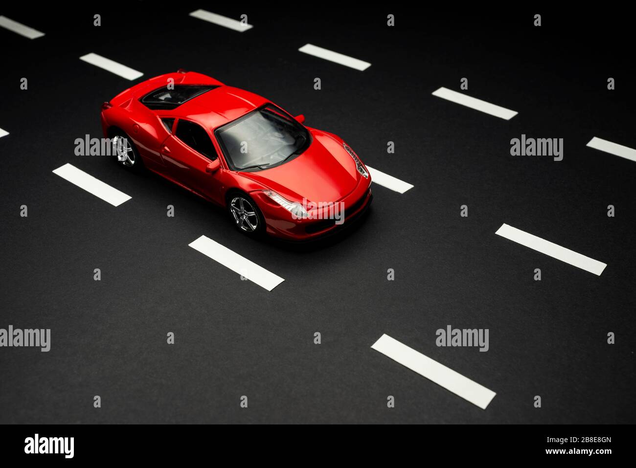 Izmir, Turkey July 28, 2019 Top and front view of Red toy sports car