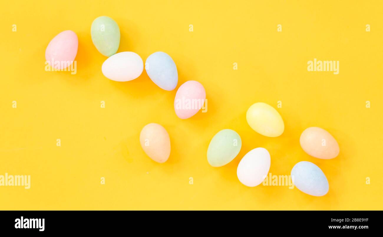 Easter eggs on yellow background Stock Photo
