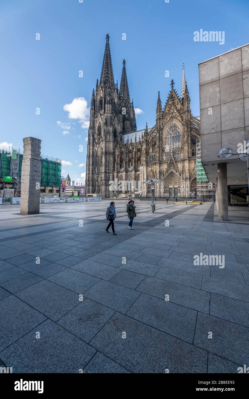 Effects of the coronavirus crisis, empty square at Cologne Cathedral, Roncalliplatz, Cologne,Germany, Stock Photo