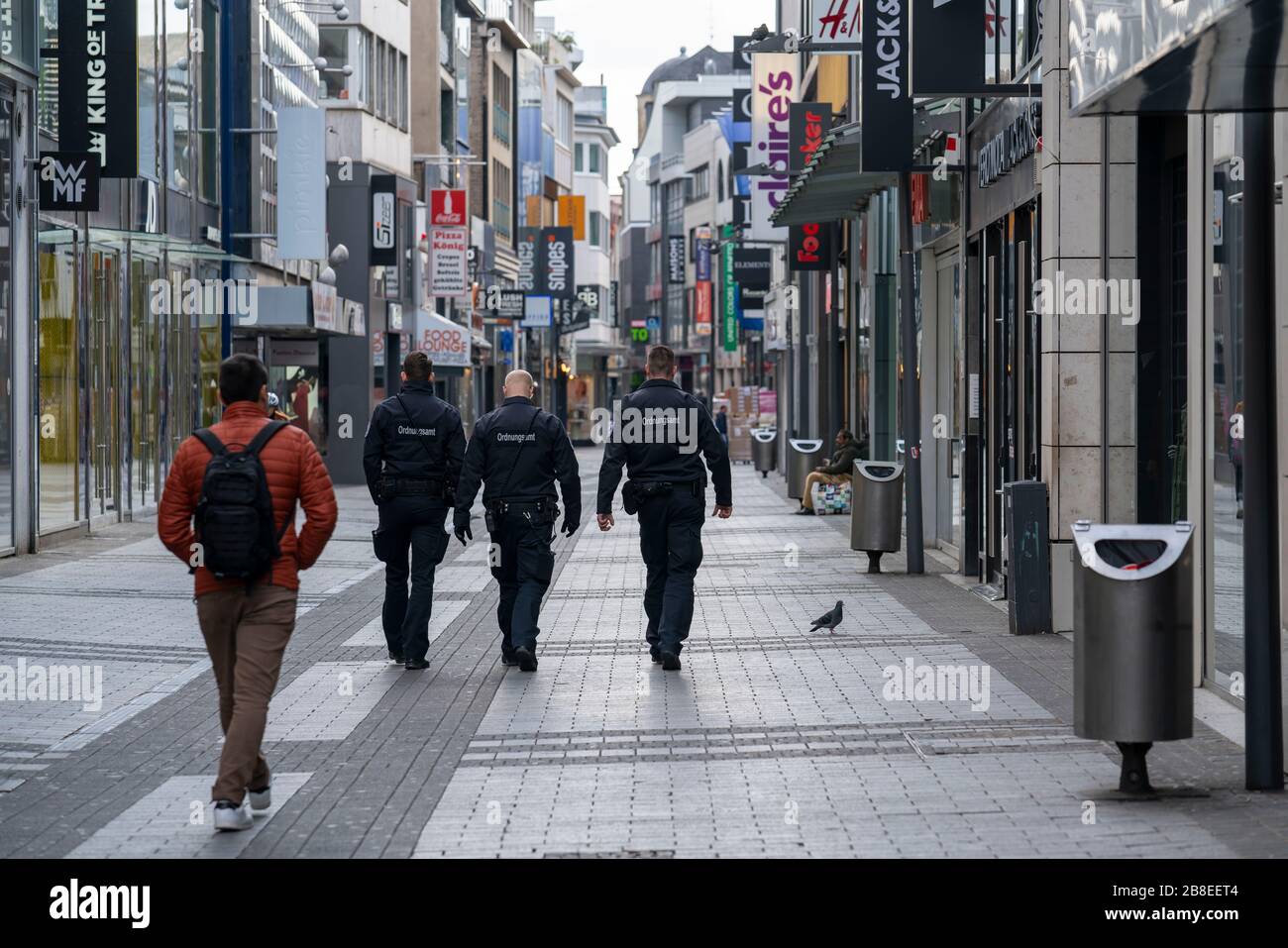 Effects of the coronavirus crisis, empty shopping street, patrol from the public order office, around 1400 hours on Saturday, normally thousands of pe Stock Photo