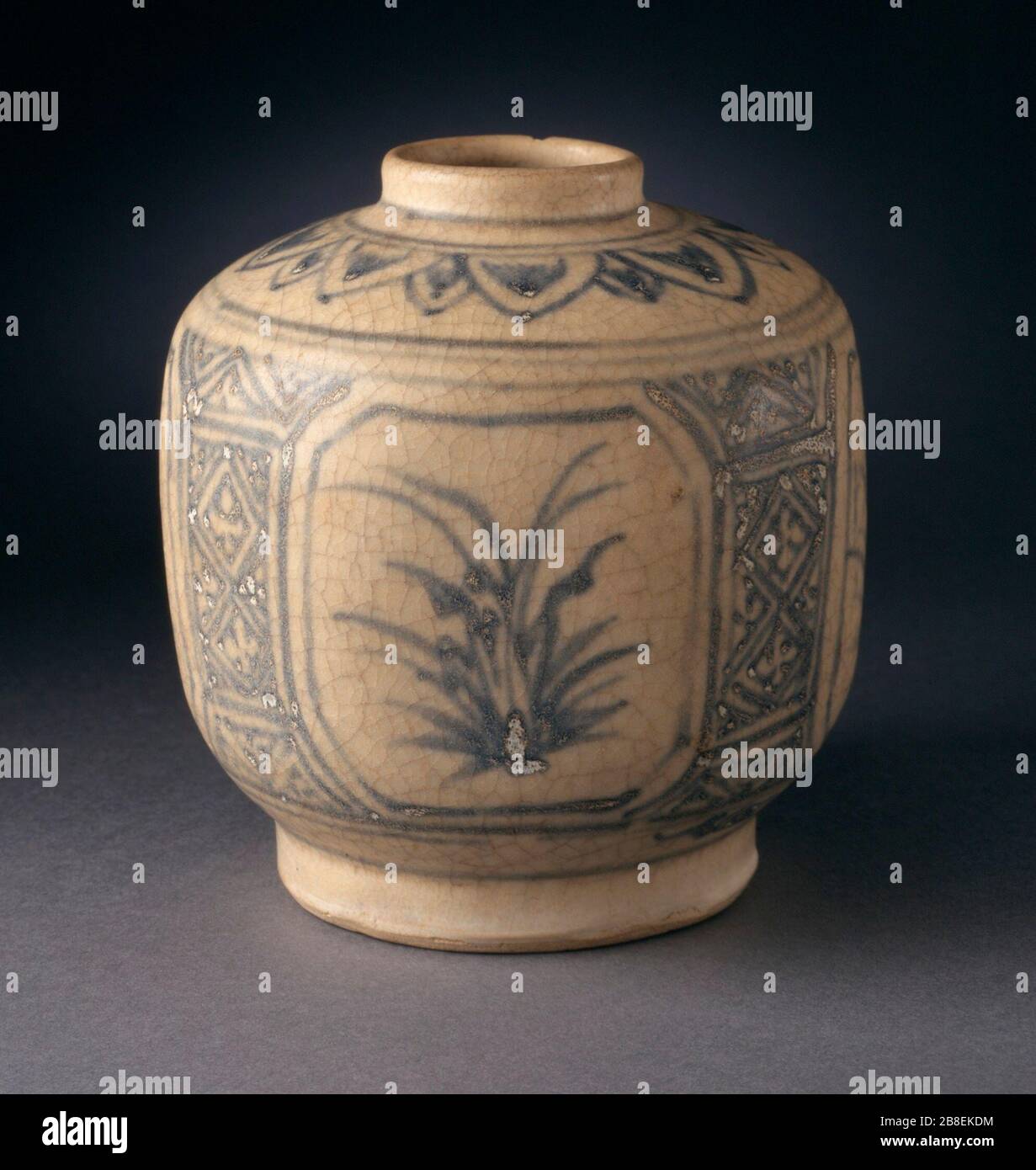 'Faceted Jar with Vegetal Sprays and Floral Petals; English:  Vietnam, 1450-1550 Furnishings; Serviceware Wheel-thrown stoneware with cream slip, underglaze blue painted decoration, and clear glaze Gift of Ambassador and Mrs. Edward E. Masters (M.84.213.239) South and Southeast Asian Art; between 1450 and 1550 date QS:P571,+1500-00-00T00:00:00Z/6,P1319,+1450-00-00T00:00:00Z/9,P1326,+1550-00-00T00:00:00Z/9; ' Stock Photo