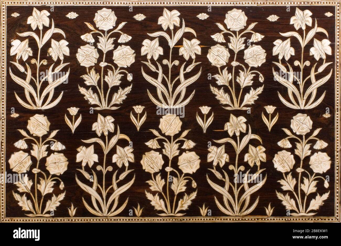 'Fall-Front Cabinet (image 10 of 22); English:  India, Gujarat or Pakistan, Sindh, circa 1650-1670 Furnishings; Furniture Rosewood inlaid with ivory; brass fittings 15 1/8 x 21 3/4 x 16 in. (38.42 x 55.25 x 40.64 cm) Purchased with funds provided by Jane and Marc Nathanson, Bill and Dee Grinnell, Greg and Mechas Grinnell, and Marilyn B. and Calvin B. Gross through the 2007 Collectors Committee (M.2007.56) South and Southeast Asian Art Currently on public view: Ahmanson Building, floor 4; between circa 1650 and circa 1670 date QS:P571,+1650-00-00T00:00:00Z/7,P1319,+1650-00-00T00:00:00Z/9,P1326, Stock Photo