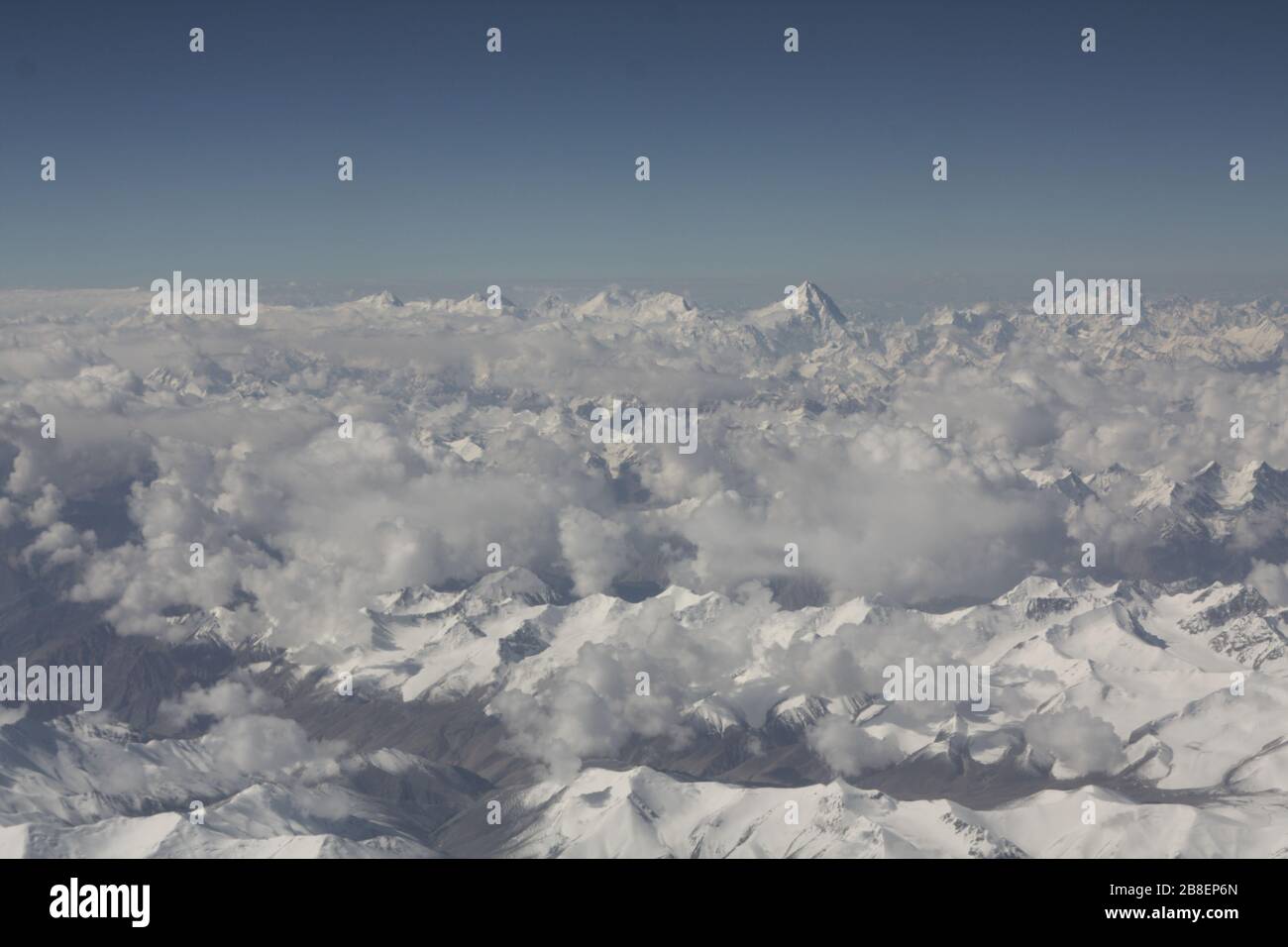 View of the himalayas with clouds hi-res stock photography and images ...