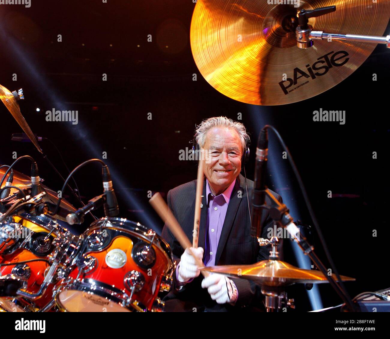 Drummer Nigel Olsson does a pre show photo shoot before he performs