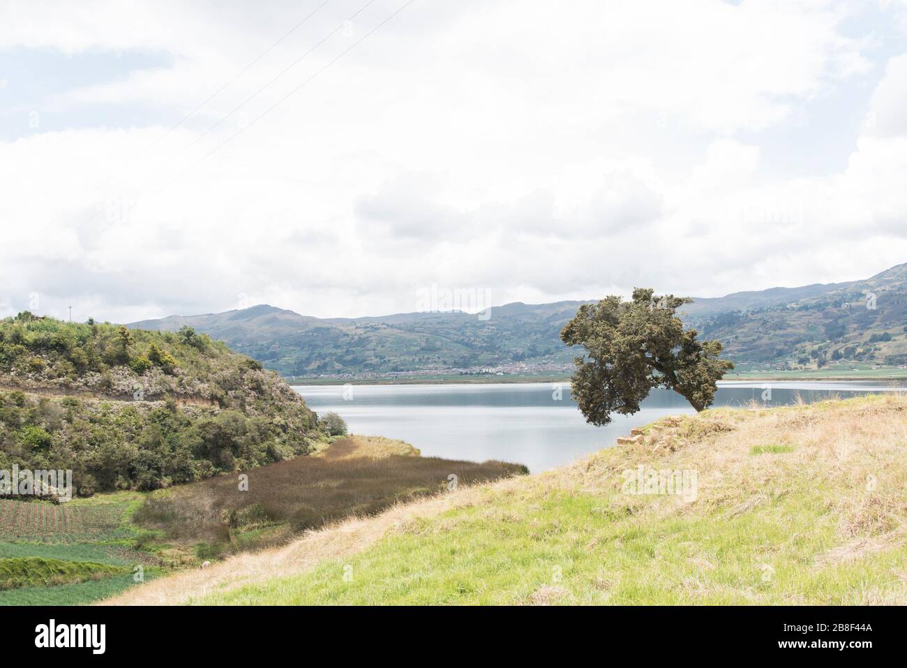 Aquitania, Boyaca / Colombia; April 8, 2018: Rural Andean landscape, Tota, the largest Colombian lake, and the fields that surround it Stock Photo
