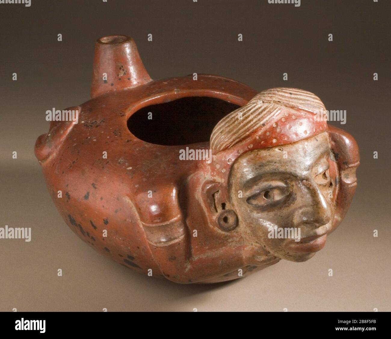 'Figural Vessel with Spout (image 1 of 2); English:  Guatemala, Southern Highlands, Maya, 100-300 Furnishings; Serviceware Burnished and slipped ceramic 4 1/8 x 6 3/4 x 5 1/2 in. (10.48 x 17.15 x 13.97 cm) Purchased with funds provided by the Joan Palevsky Bequest (M.2006.101) Art of the Ancient Americas Currently on public view: Art of the Americas Building, floor 4; 100-300; ' Stock Photo