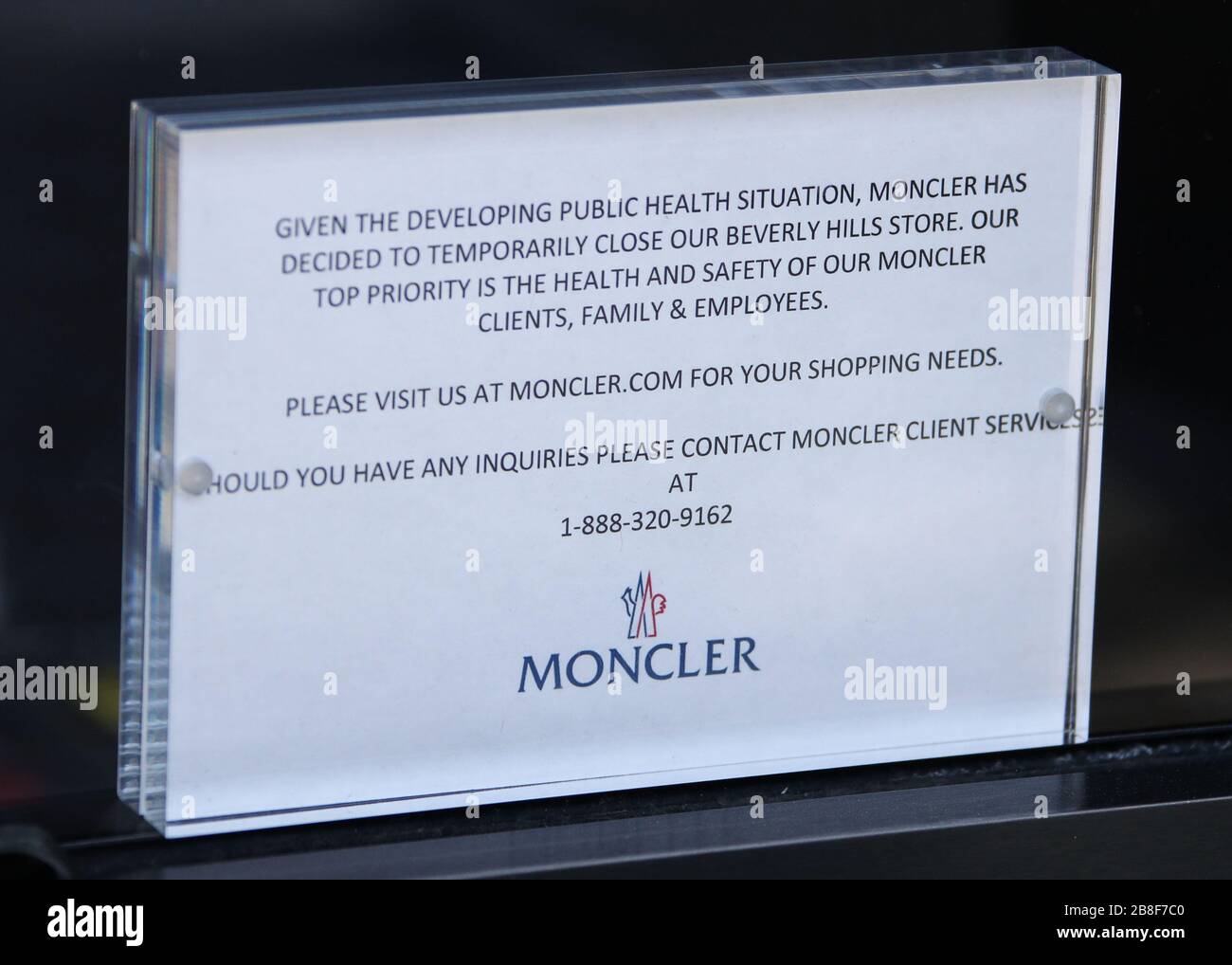 BEVERLY HILLS, LOS ANGELES, CALIFORNIA, USA - MARCH 21: Moncler Beverly  Hills Rodeo Drive store, temporarily closed due to the coronavirus, two  days after the 'Safer at Home' order issued by both