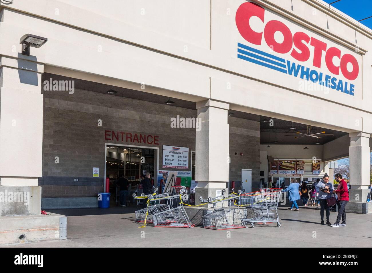 Costco in Modesto California using shopping carts to limit traffic into the store because of the Covid 19 virus Stock Photo
