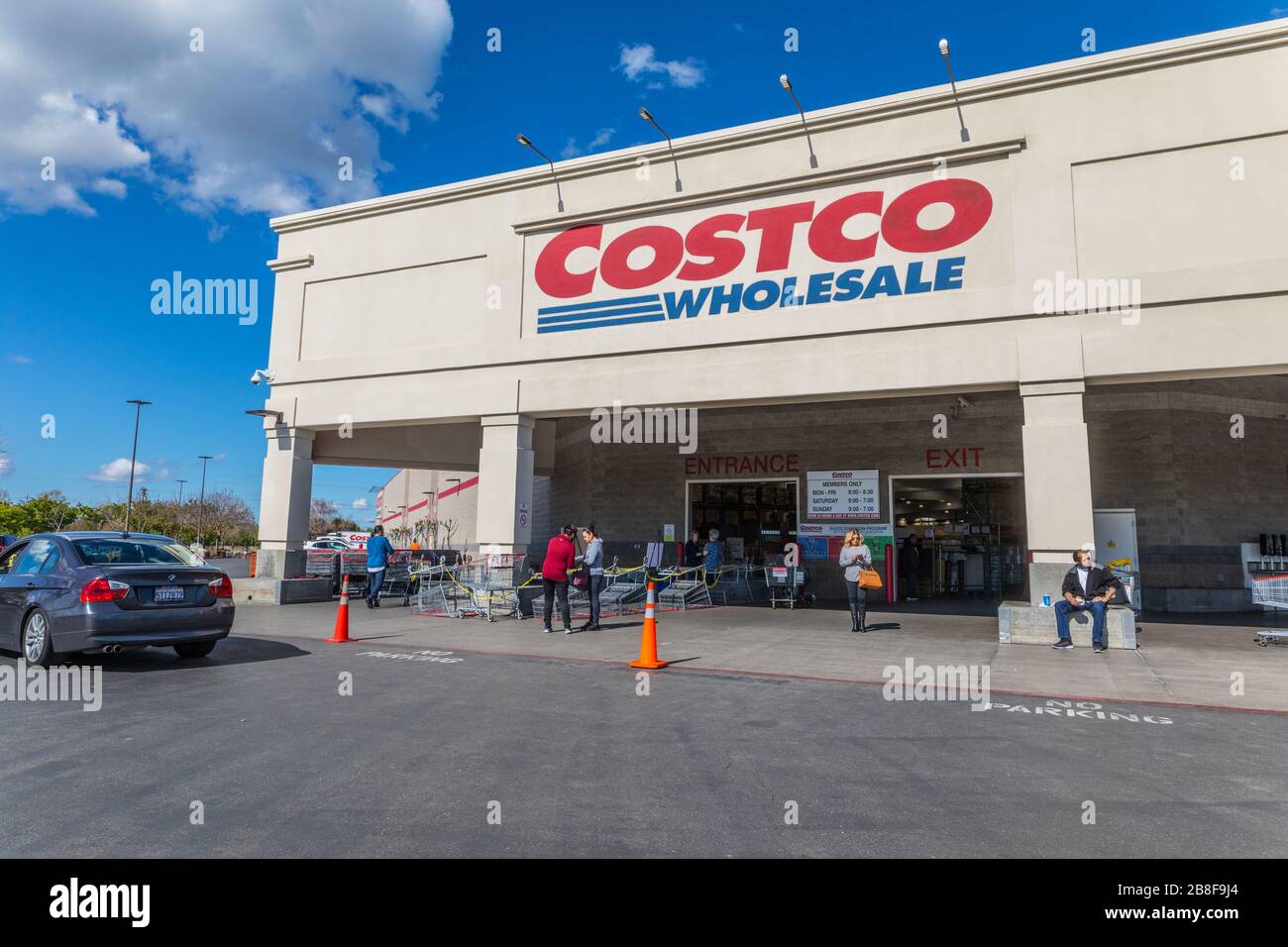 Costco in Modesto California using shopping carts to limit traffic into the store because of the Covid 19 virus Stock Photo