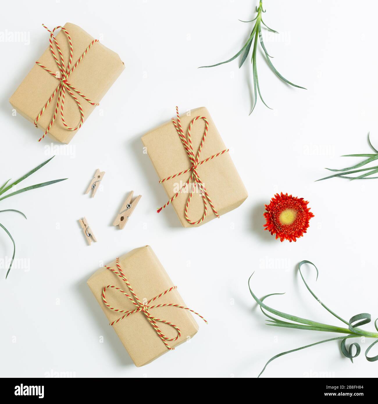 Gift boxes with floral decoration. Flat lay, top view Stock Photo