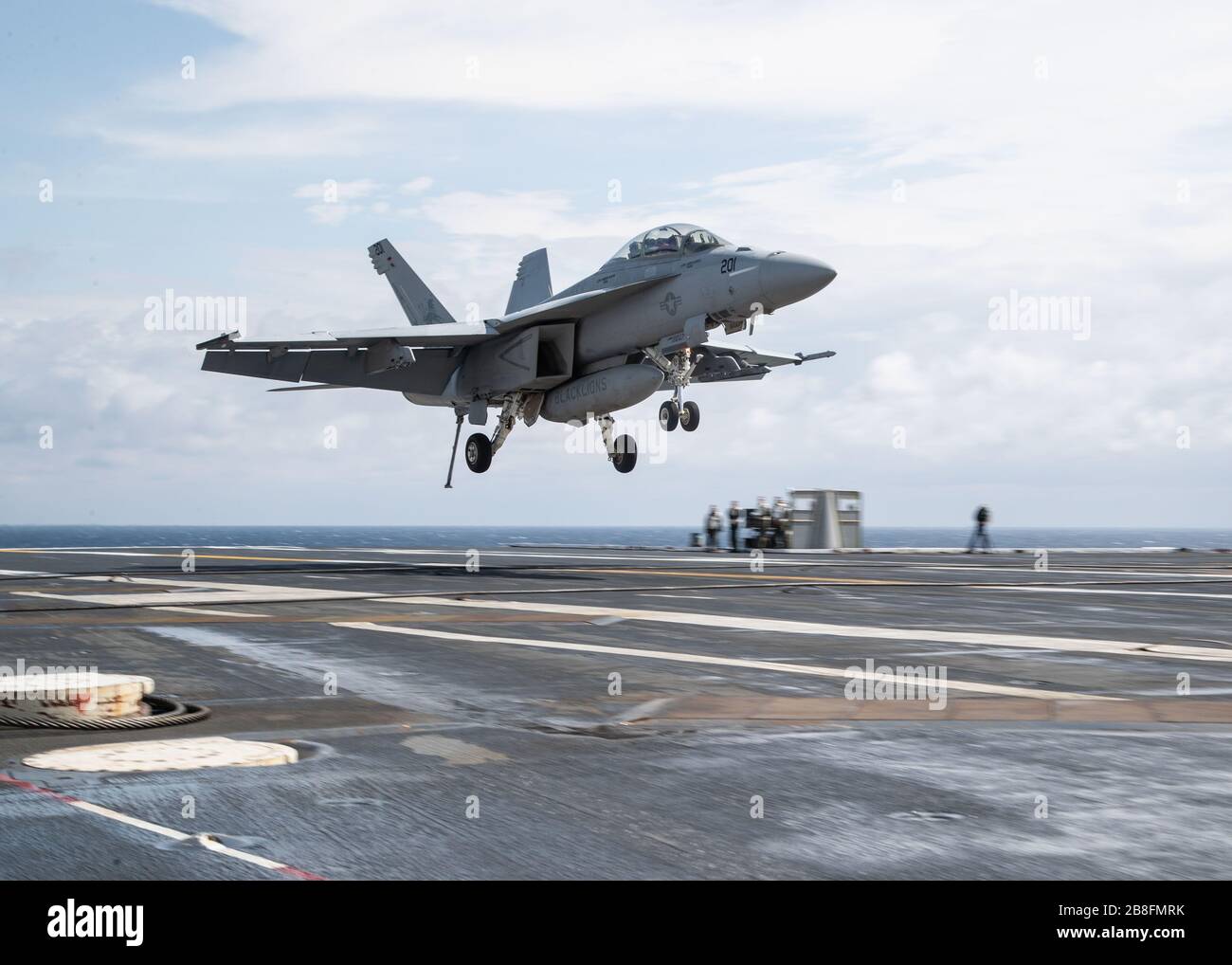 ATLANTIC OCEAN (March 19, 2020) An F/A-18F Super Hornet, attached to 'Black Lions' of Strike Fighter Squadron (VFA) 213, lands on USS Gerald R. Ford's (CVN 78) flight deck during flight operations. Ford is currently underway conducting its flight deck and combat air traffic control center certifications. (U.S. Navy photo by Mass Communication Specialist 3rd Class Zachary Melvin) Stock Photo