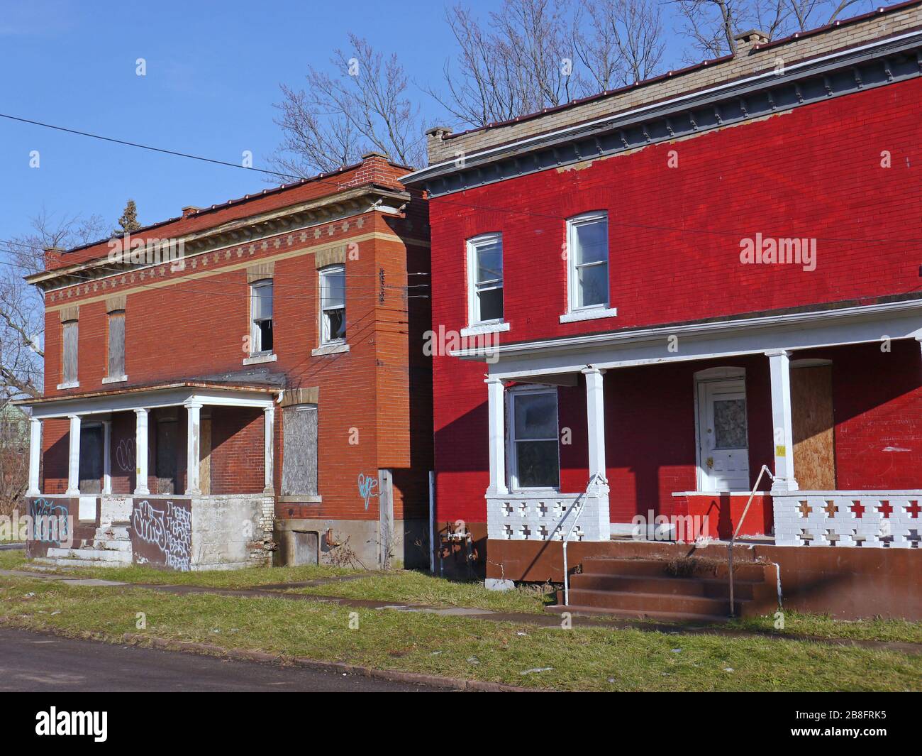 Derelict old houses with boarded up windows Stock Photo