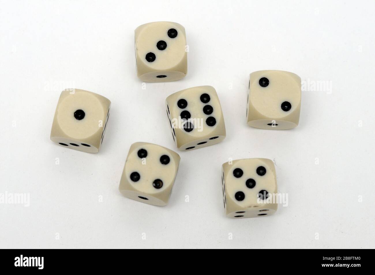 Six Dice With Six On A White Surface Stock Photo, Picture and