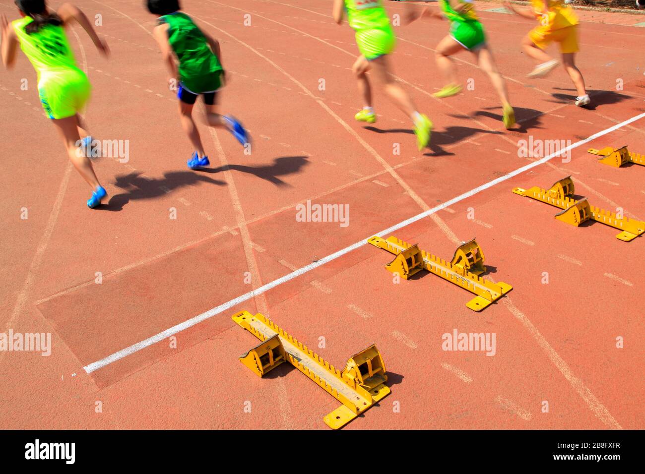 The launching, At the sports meeting, the athletes are starting to run