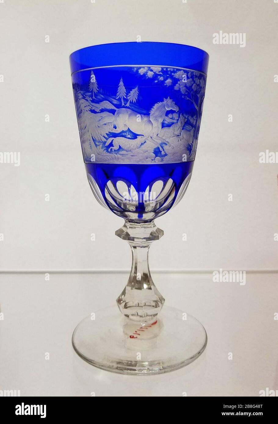 Goblet, Louis F. Vaupel, New England Glass Company, c. 1860-1875, blown, cobalt-blue cased glass, cut and engraved Stock Photo