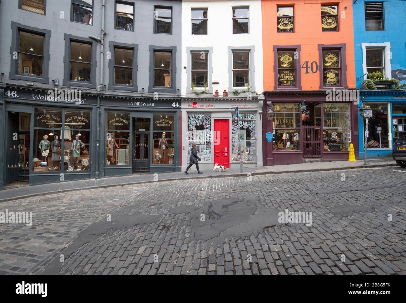 Closed shops along Edinburgh's Victoria Street during the coronavirus outbreak. Stock Photo