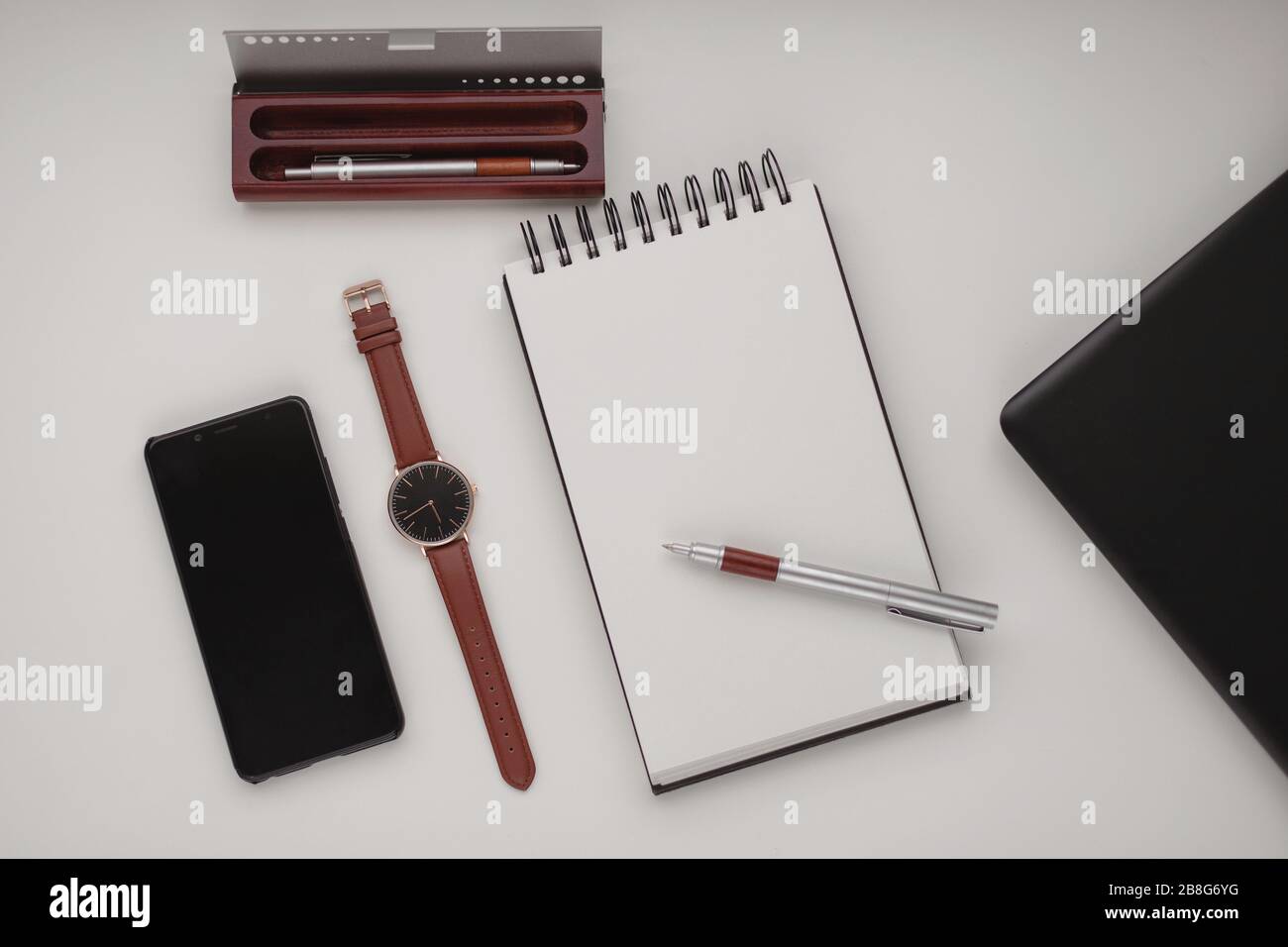 Minimalist Workspace Background With Laptop Pen Pen Case Wrist