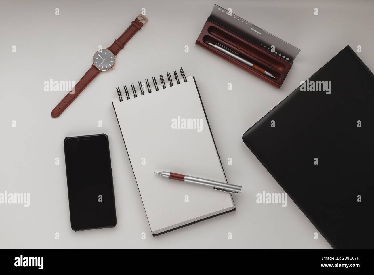Minimalist Workspace Background With Laptop Pen Pen Case Wrist